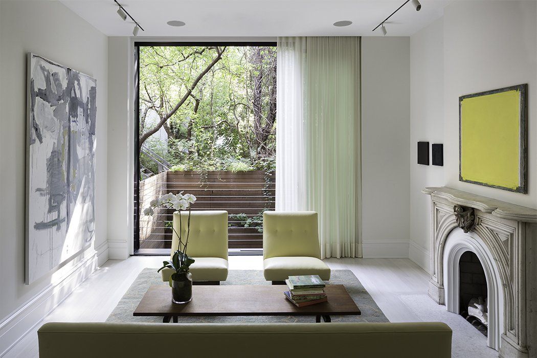 choosing ideal curtains, This West Village townhouse integrates the interiors with the outdoor landscape courtesy of floor-to-ceiling windows draped in sheer curtains, 